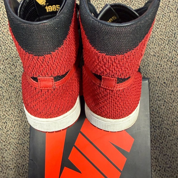Jordan 1 Retro High Flyknit Bred - Black and Red Sneakers - Picture 4 of 6